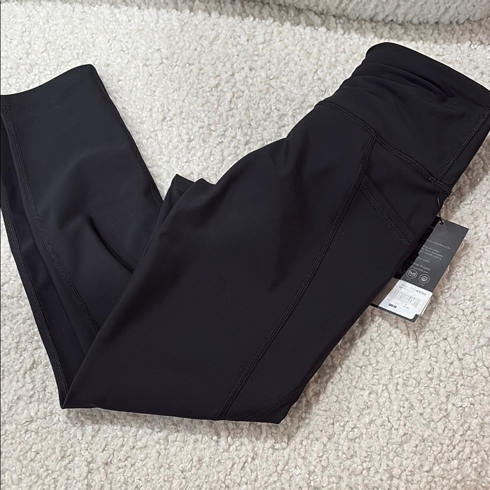 Kinesis fitness/casual black tights with pockets NEW!
Retail 59.00 SzXS